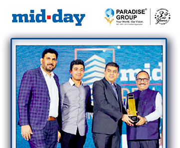 Manish Bathija and Ansh Bhathijafrom Paradise Group being felicitated for Iconic Project of The Year